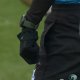 Mathew Carley's gloves become the talking point