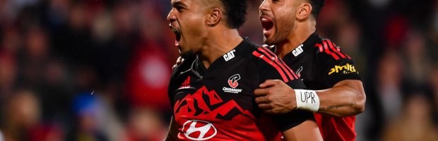 Crusaders-star-Leicester-Faingaanuku-celebrates-with-Richie-Moun
