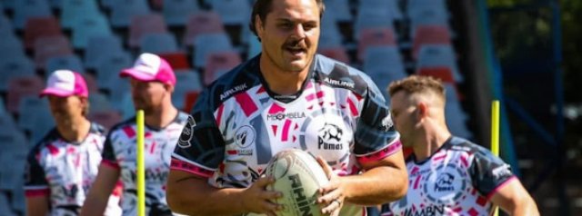 South African tighthead Ruan 'Sampie' Swiegers signs at the Stoop